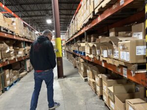 Ramsey Kanaan walks through the Binghamton warehouse | Source: Lucy Calderon
